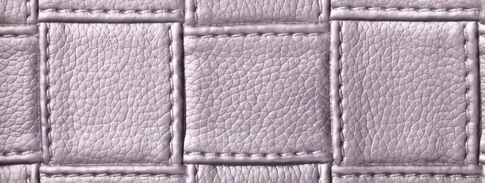 Texture light gray leather background with quilted stitched pattern, macro... Stock Photos
