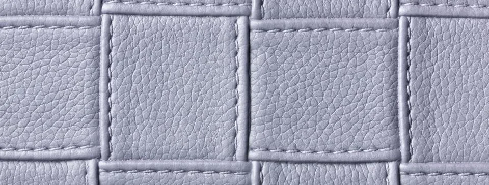 Texture light gray leather background with quilted stitched pattern, macro. A Foto stock