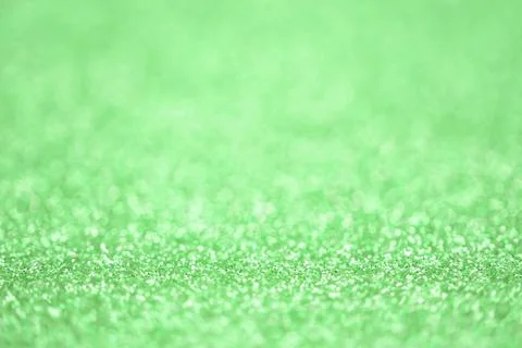 Texture of light green silver glitter dust surface, luxury background with bo Foto stock