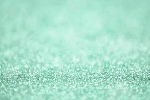 Texture of light green silver glitter dust surface, luxury background with bo Stock Photos