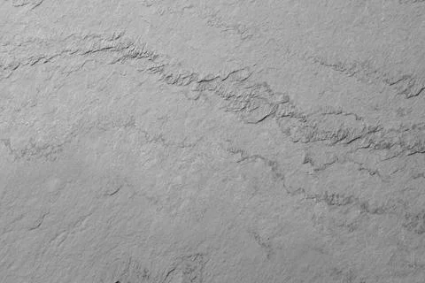 Texture of light grey stone surface as background, closeup Stock Photos