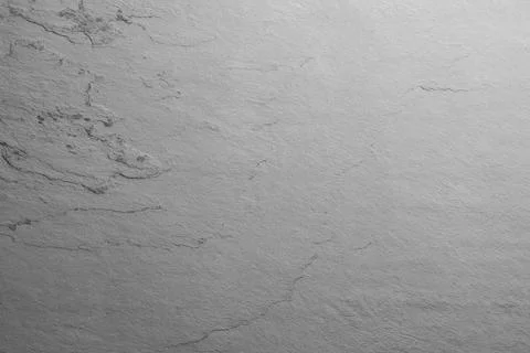 Texture of light grey stone surface as background, closeup Stock Photos