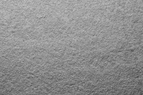 Texture of light grey stone surface as background, closeup Foto stock