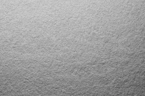 Texture of light grey stone surface as background, closeup Stock Photos