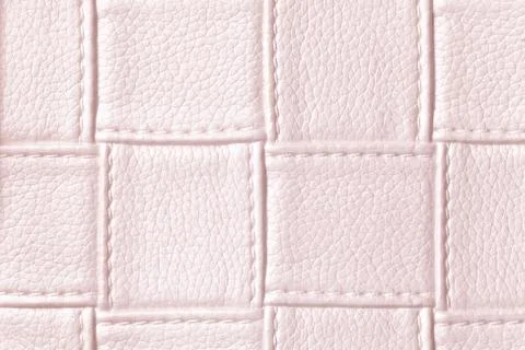 Texture of light pink leather background with square pattern and stitch, macr Foto stock