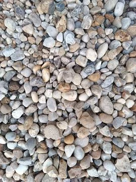 Texture of light rounded stones Stock Photos