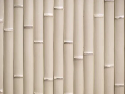 Texture of a light yellow bamboo pattern wall Stock Photos