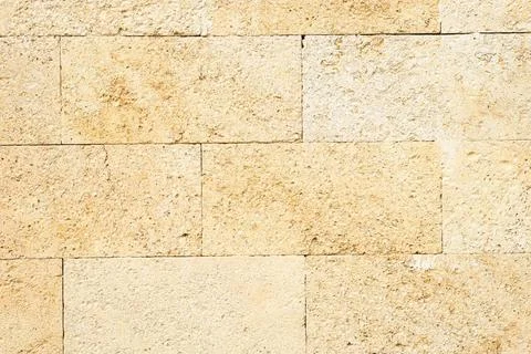 Texture of limestone wall as background Stock Photos