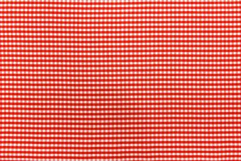 The texture of linen fabric in a large cell of red and white. Scottish tail.. Foto stock