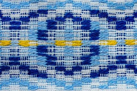 Texture of linen fabric with a pattern. Pattern on textiles Stock Photos