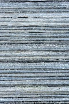 The texture of the lines of packed cement slate for the roof roof Stock Photos