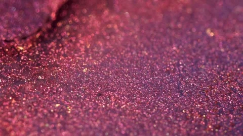 Texture of liquid decorative cosmetics macro. Magic glitter shiny background Stock Footage 244288743