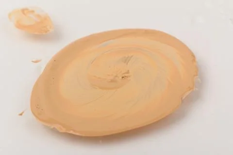 Texture of liquid foundation Background made of liquid foundation Make-up con Stock Photos