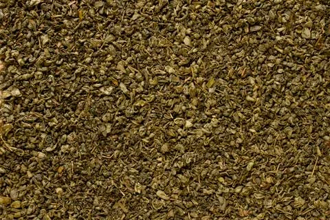 Texture with loose leaf green tea, top view. Texture abstract background. Stock-Fotos