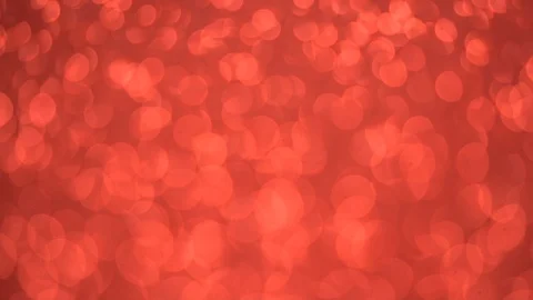 Texture of many rotating round bokeh on a red background. Stock Footage 122515535