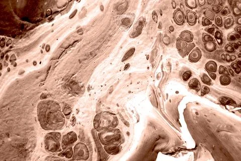 The texture of marble. Abstract background, made in the technique of fluid art. Stock Photos