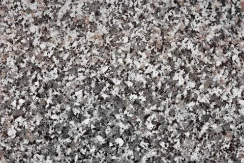 The texture of the marble chips. Grey, black and brown stone. Close up Stockfoto's