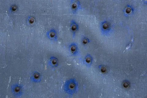 Texture of metal door with nails in line patterns Stock Photos