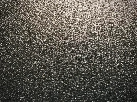 The texture of the metal is multicolored. Made with iPhone 11 in the Republic Stock Photos