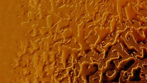 Texture of the metal surface of a wall made of non-ferrous metal. 写真素材