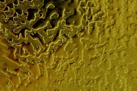 Texture of the metal surface of a wall made of non-ferrous metal. Stock Photos