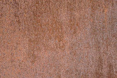The texture of a metal thick sheet covered with rust, stains and corrosion .. Stock Photos