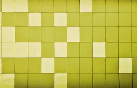 The texture of the metal wall, framed in the form of colored squares of two Stock Photos