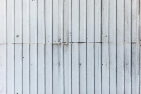 Texture of the metal wall with junction of panels Stock Photos