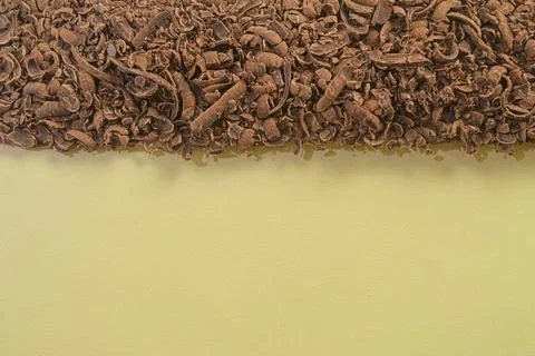 Texture of milk chocolate shavings. Ground chocolate background. Scattered gr Stock-Fotos