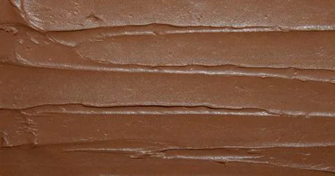 Texture of milk chocolate.Chocolate paste background. Stock Photos