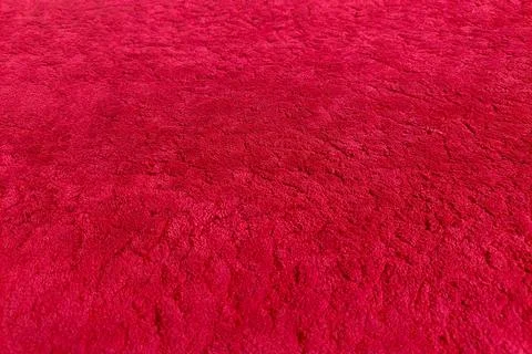 The texture of the mosque's thick, hairy red carpet Stock Photos