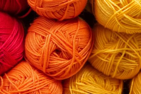 The texture of multi-colored fluffy woolen threads for knitting. Stock Photos