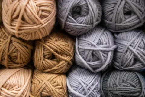 The texture of multi-colored fluffy woolen threads for knitting. Stock Photos