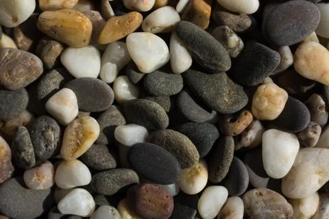Texture of multi-colored pebble stones Stock Photos