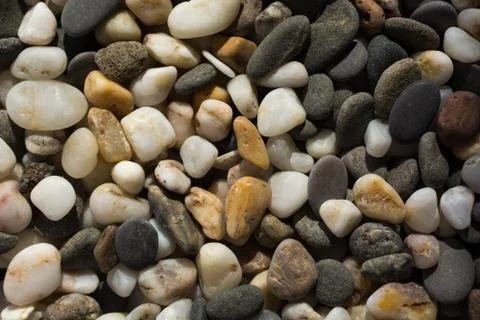 Texture of multi-colored pebble stones Stock Photos