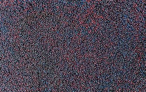 Texture of multi-colored slime with foam balls. Abstract background of educat Stockfoto's