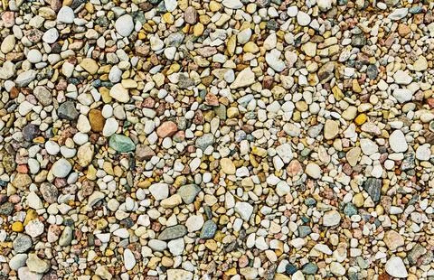 Texture of multi-colored small smooth river pebbles Stock Photos