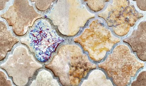 Texture of multi colored tiles on the wall of the building Stock Photos