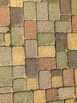 Texture of multicolored beautiful rectangular stone concrete paving brick til 스톡 사진