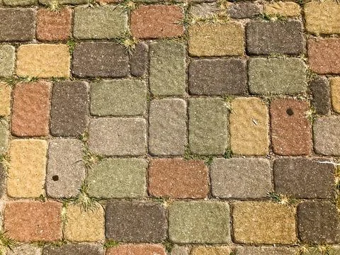 Texture of multicolored beautiful rectangular stone concrete paving brick til Stock Photos