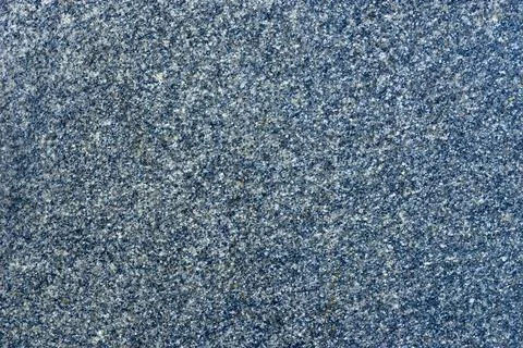 The texture of natural polished granite. Pattern, background. Stock Photos