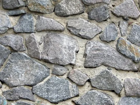 Texture of natural stone material and brick masonry walls Stock Photos
