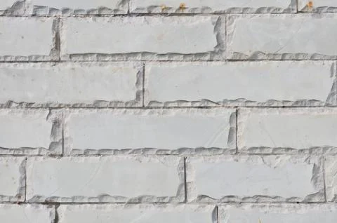 Texture of the new accurate gray brick wall Stock Photos