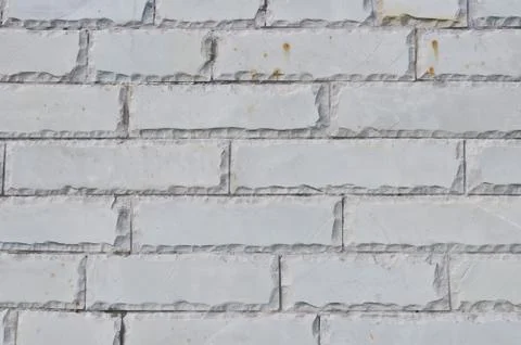 Texture of the new accurate gray brick wall Stock Photos