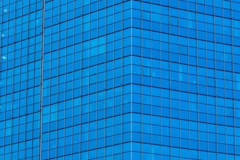 The texture of the office building Windows is blue Stock Photos