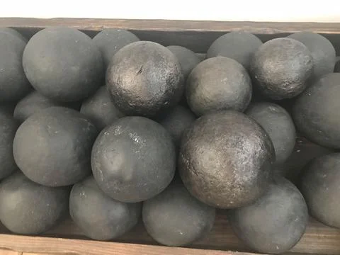 Texture of old antique combat round gray metallic, iron, stone cannon balls,  Stock Photos