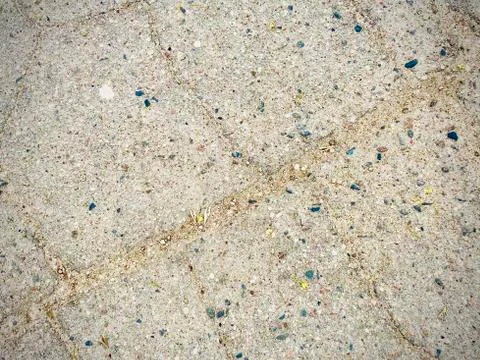 The texture of the old asphalt. Made with a mobile. A close-up. Stock Photos