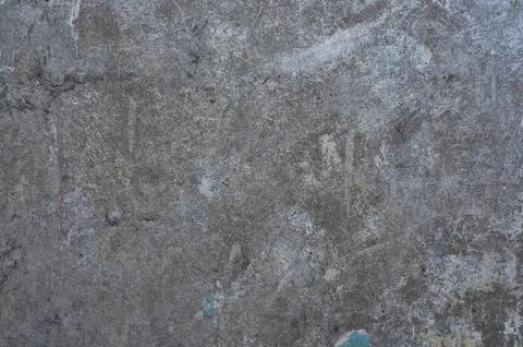 Texture of the old battered wall blue peeling paint, concrete, gray cement gr Stock Photos