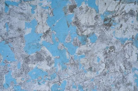 Texture of the old battered wall blue peeling paint, concrete, gray cement gr Stock Photos