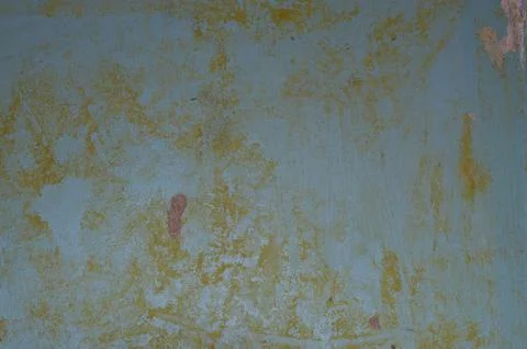 Texture of the old battered wall blue peeling paint, concrete, gray cement gr Stock Photos
